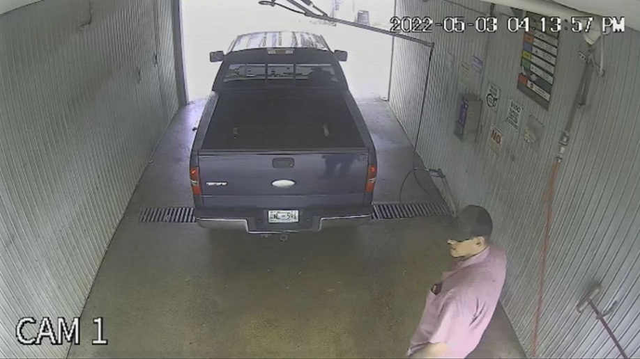 Photo provided by USMS on May 9, 2022, shows a man standing next to a 2006 Ford F-150 had been abandoned at a car wash in the 2000 block of South Weinbach Avenue in Evansville.