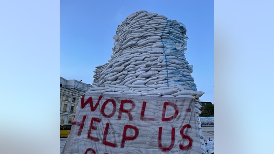 "World Help Us" sign in Ukraine