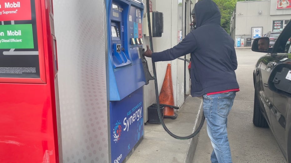 New Jersey gas station attendant pumps gas