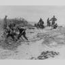 Soldiers on the mortar crew prepare to fire at enemies during D-Day invasion.