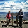 Senior couple at the summit of Mount Washburn, the highest point in Yellowstone National Park.