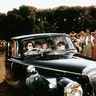 Queen Elizabeth driving Prince Charles, Princess Anne
