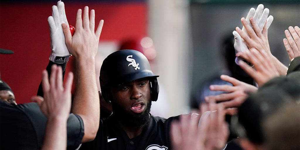 Chicago White Sox's Jose Abreu smiles after hitting a two-run double during  the seventh inning of a baseball game against the Los Angeles Angels  Tuesday, June 28, 2022, in Anaheim, Calif. (AP