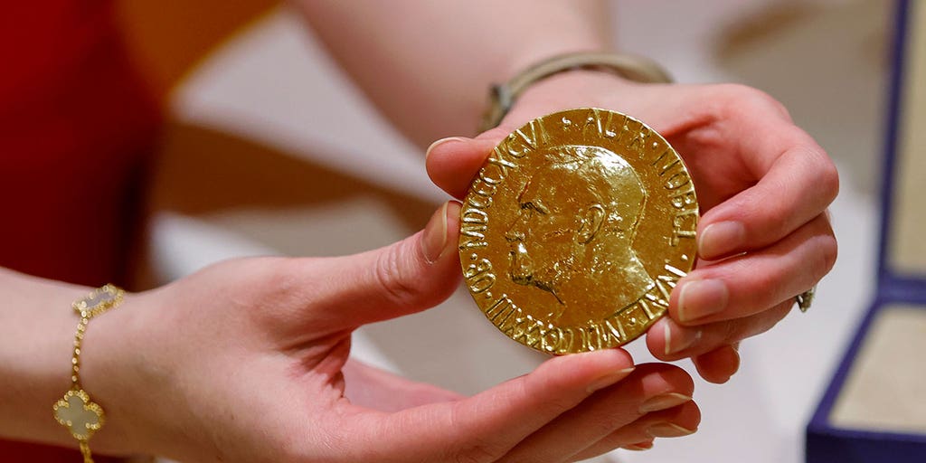https://a57.foxnews.com/static.foxnews.com/foxnews.com/content/uploads/2022/06/1024/512/nobel-medal-russian-journalist.jpg?ve=1&tl=1
