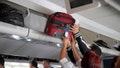 Carry-on luggage allows passengers to bring their items on board and avoid lines and wait times before and after their flight. (Photo by: Jeff Greenberg/Universal Images Group via Getty Images)