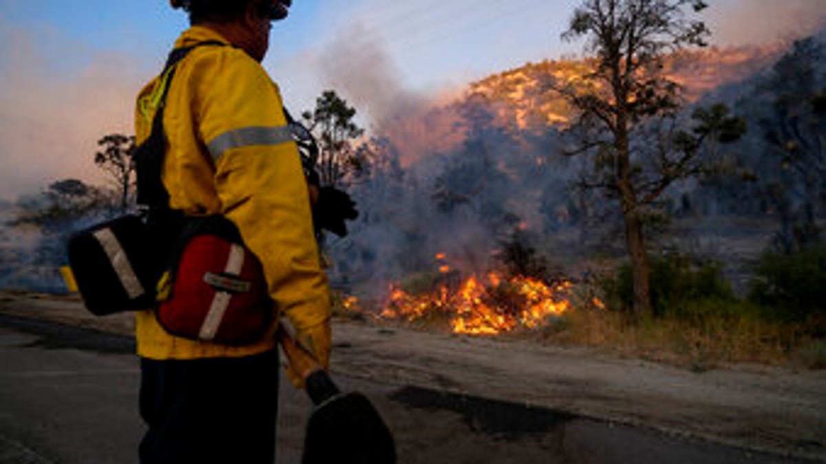 Firefighter preparing to put out a fire in California