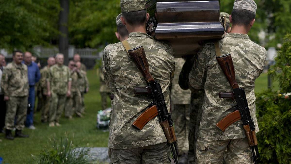 Ukraine Russia Ukrainian soldier funeral casket