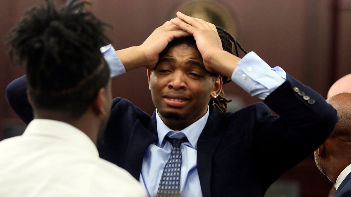 Former Virginia Tech football player Isimemen Etute emotional after not guilty verdict