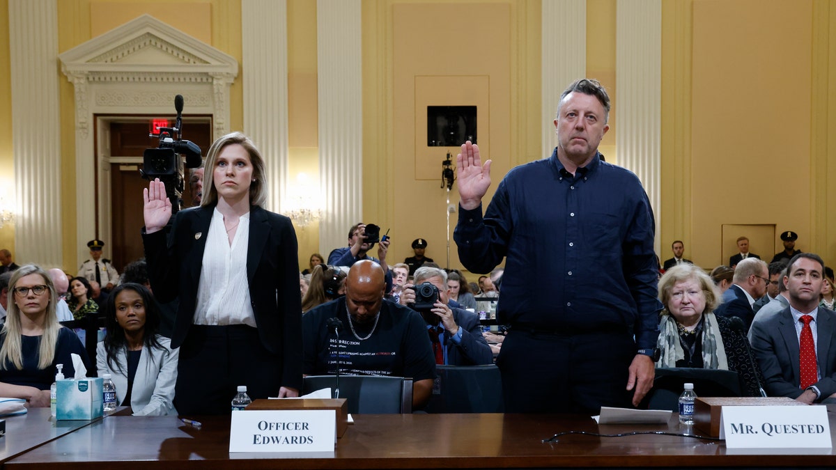 U.S. Capitol Police officer Caroline Edwards, left, and British filmmaker Nick Quested, are sworn in as the House select committee investigating the Jan. 6 attack on the U.S. Capitol holds its first public hearing to reveal the findings of a year-long investigation, on Capitol Hill in Washington, Thursday, June 9, 2022. ?(Jonathan Ernst/Pool via AP)