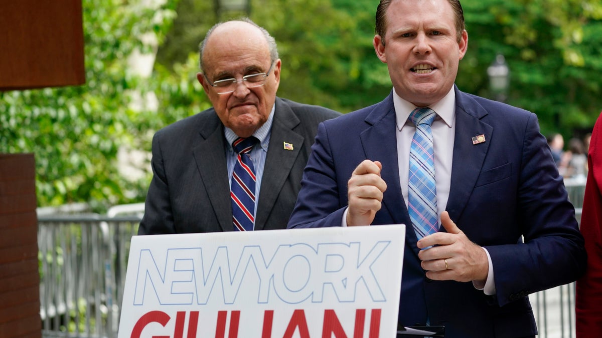 Andrew Giuliani and his dad campaign