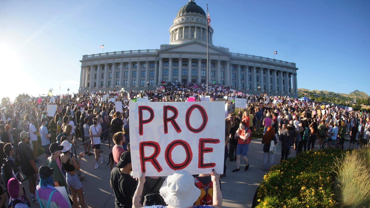 People attend an abortion-rights protest at the Utah State Capitol in Salt Lake City after the Supreme Court's Dobbs decision.