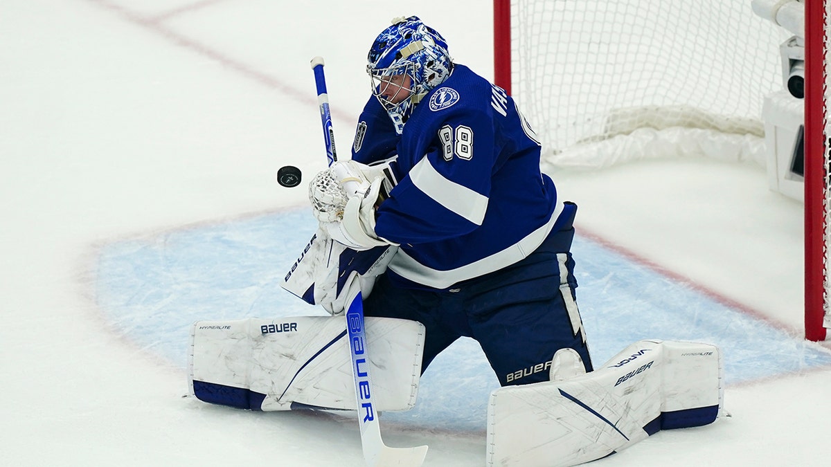 Andrei Vasilevskiy blocks a shot