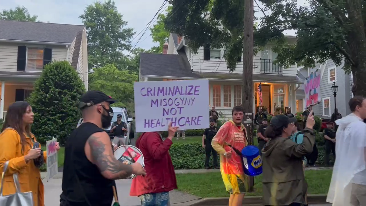 Protestors march outside Kavanaugh's home 