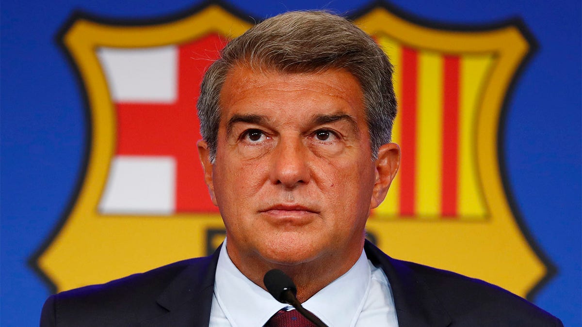 Joan Laporta fields questions at a press conference ernce