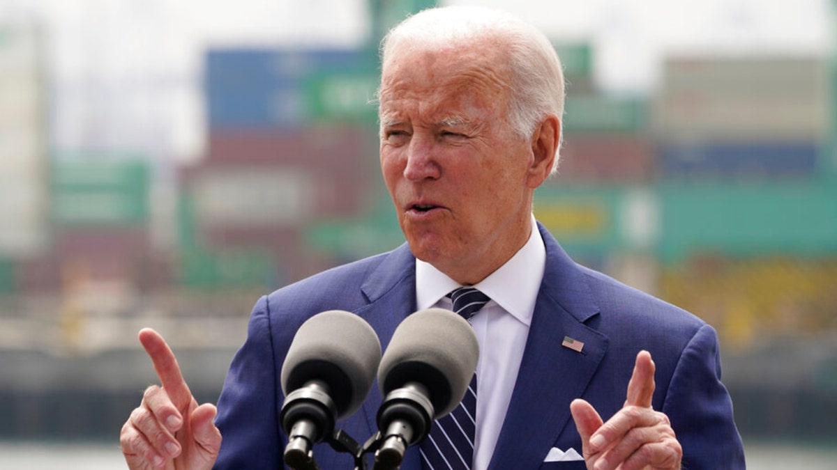 Biden pointing at podium