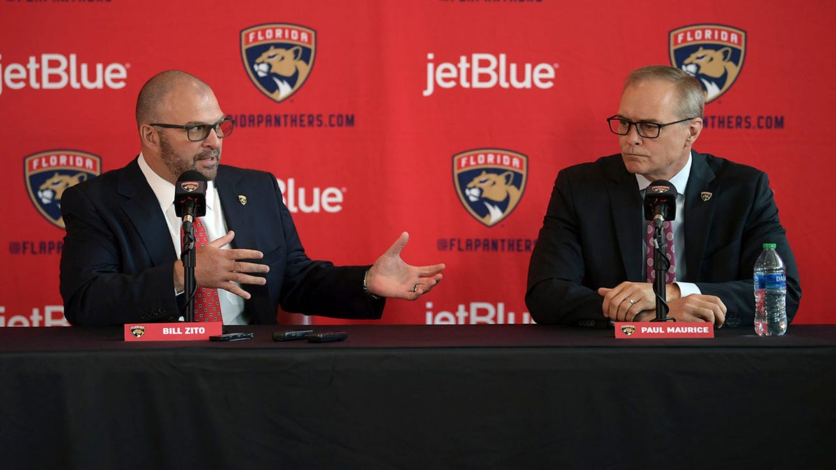 Bill Zito talking at press conference with Paul Maurice