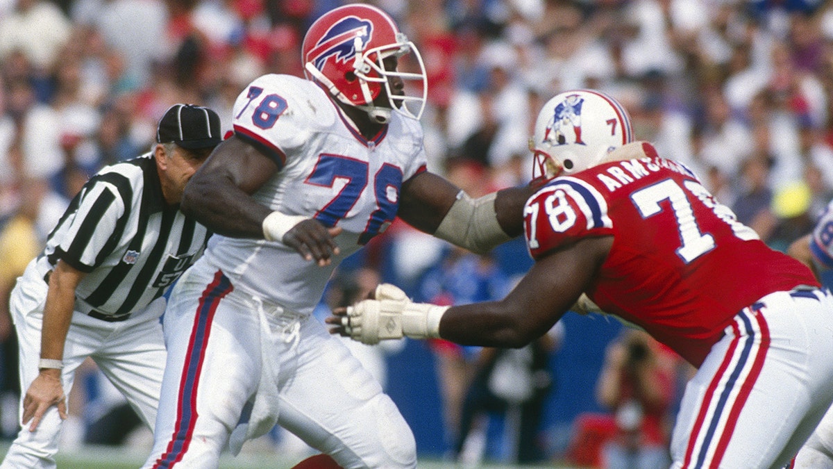 Bruce Smith faces off