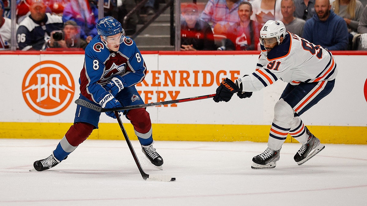 Cale Makar takes on Evander Kane