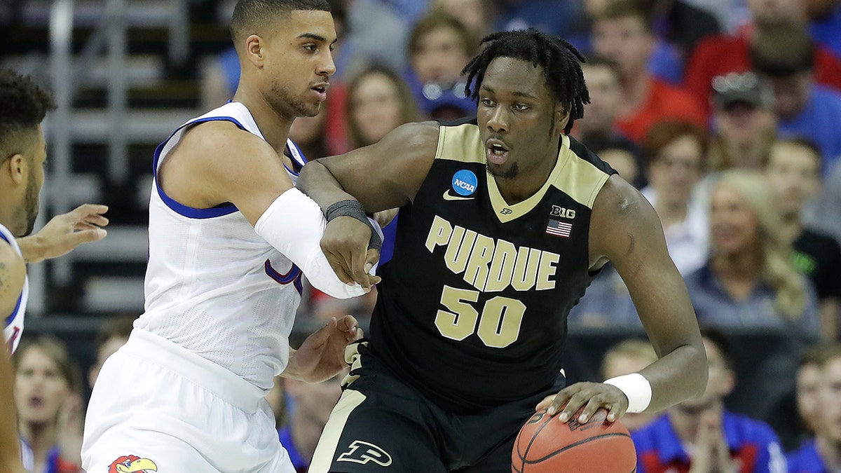 Caleb Swanigan plays against Kansas