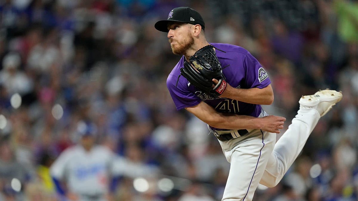 Chad Kuhl throws a pitch