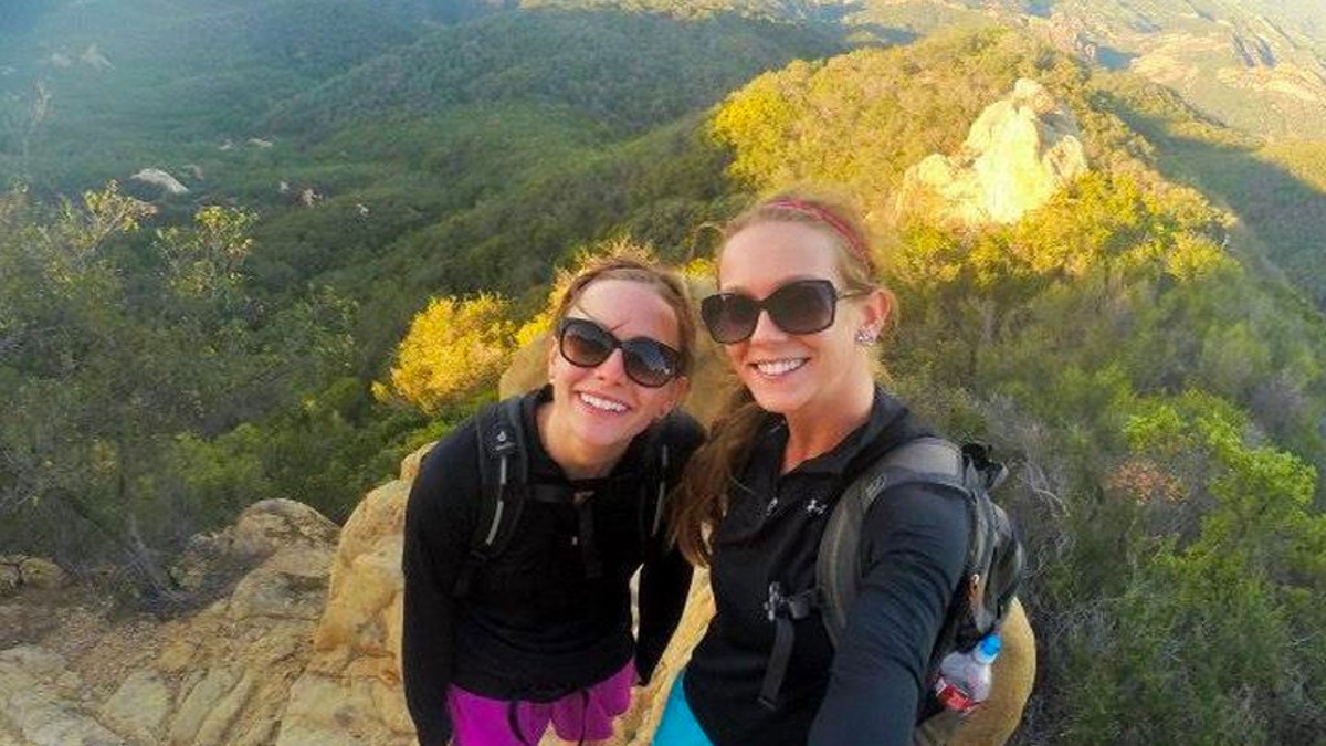 Christie and Kaitlin Armstrong wearing sunglasses on a mountain