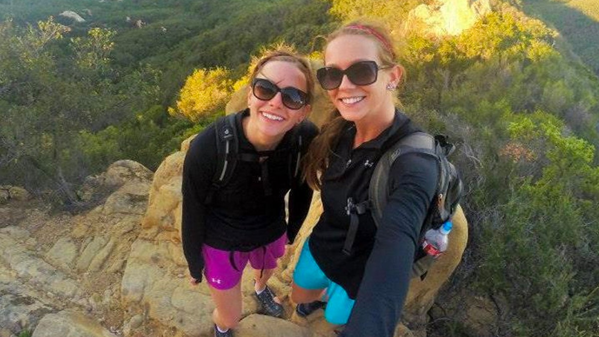 Christie and Kaitlin Armstrong wearing sunglasses on a mountain