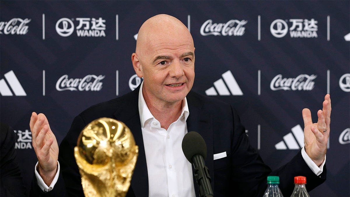 Gianni Infantino answers questions at a press conference