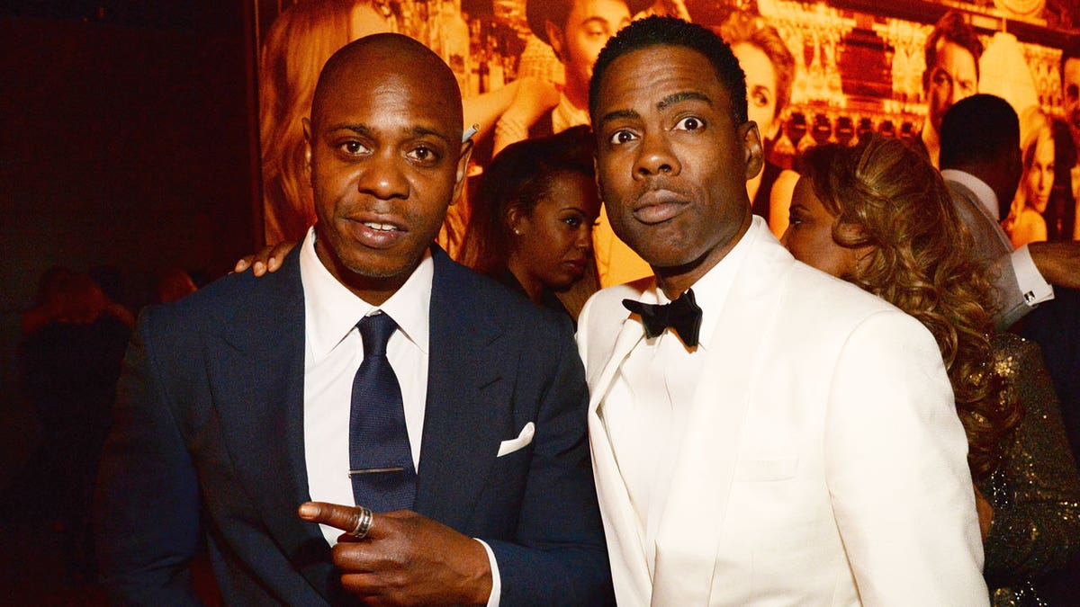 Dave Chappelle and Chris Rock at an Oscars party