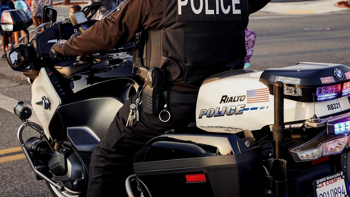 A Rialto Police Department officer on a motorcycle. 