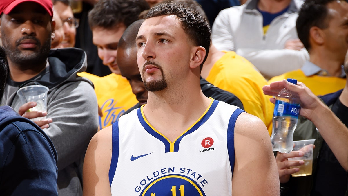 Fake Klay Thompson stands in the crowd