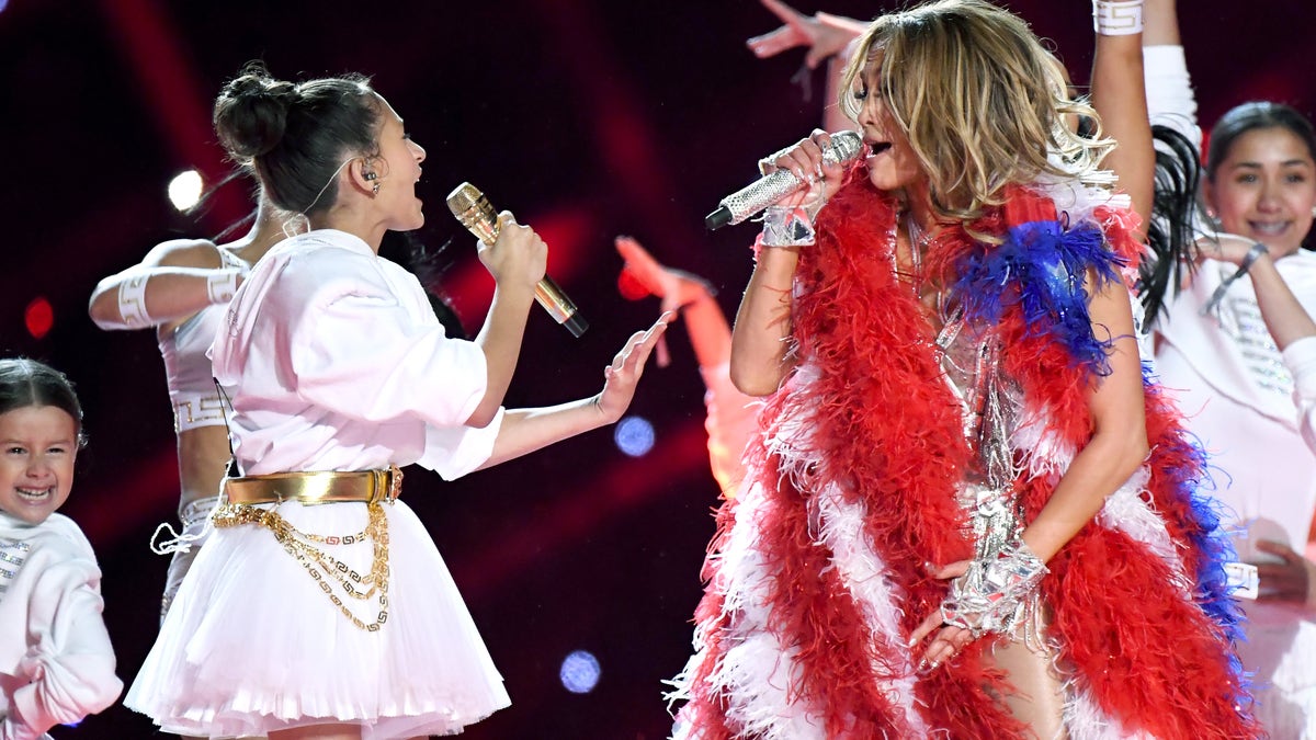 Jennifer Lopez and Emme sing during Super Bowl Halftime