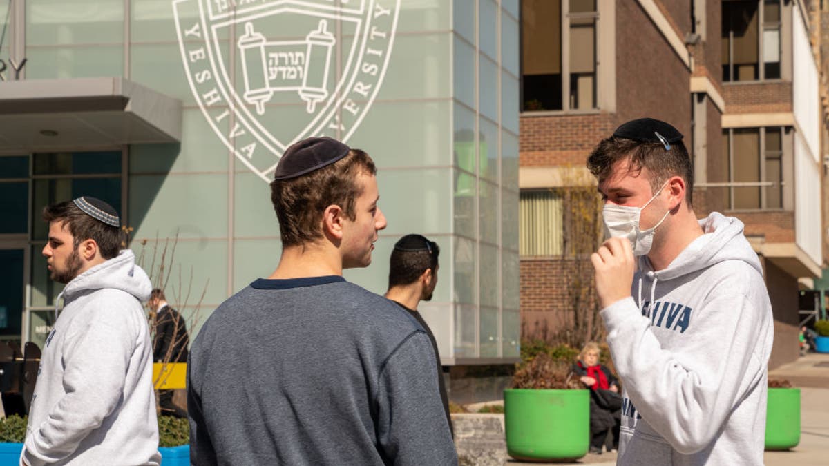 Yeshiva University students wearing kippas