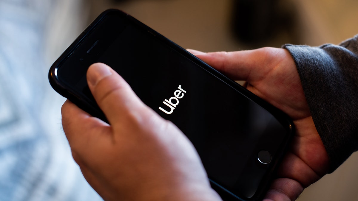 Uber logo on a phone