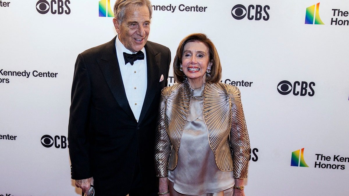 Speaker of the US House of Representatives Nancy Pelosi (R) and husband Paul Pelosi