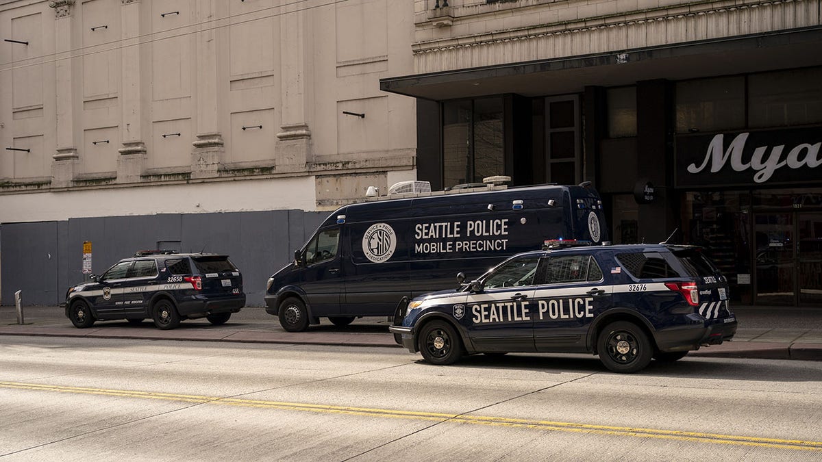 Seattle police vans on street