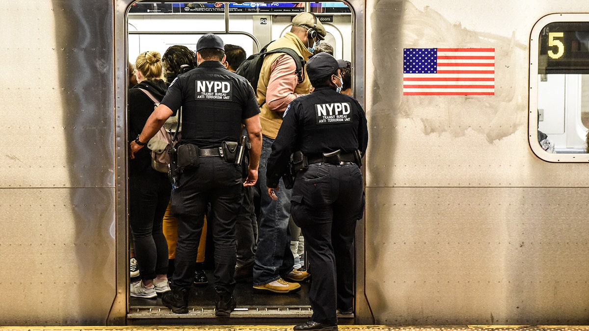 NYPD transit cops get on packed subway