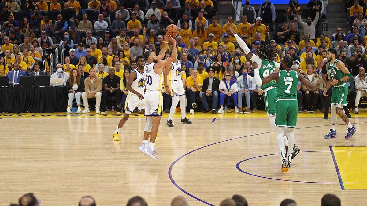 Steph Curry attempts a three in the NBA Finals