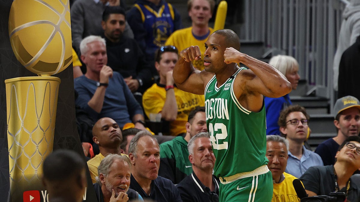Al Horford flexes in Game 1 of the NBA Finals