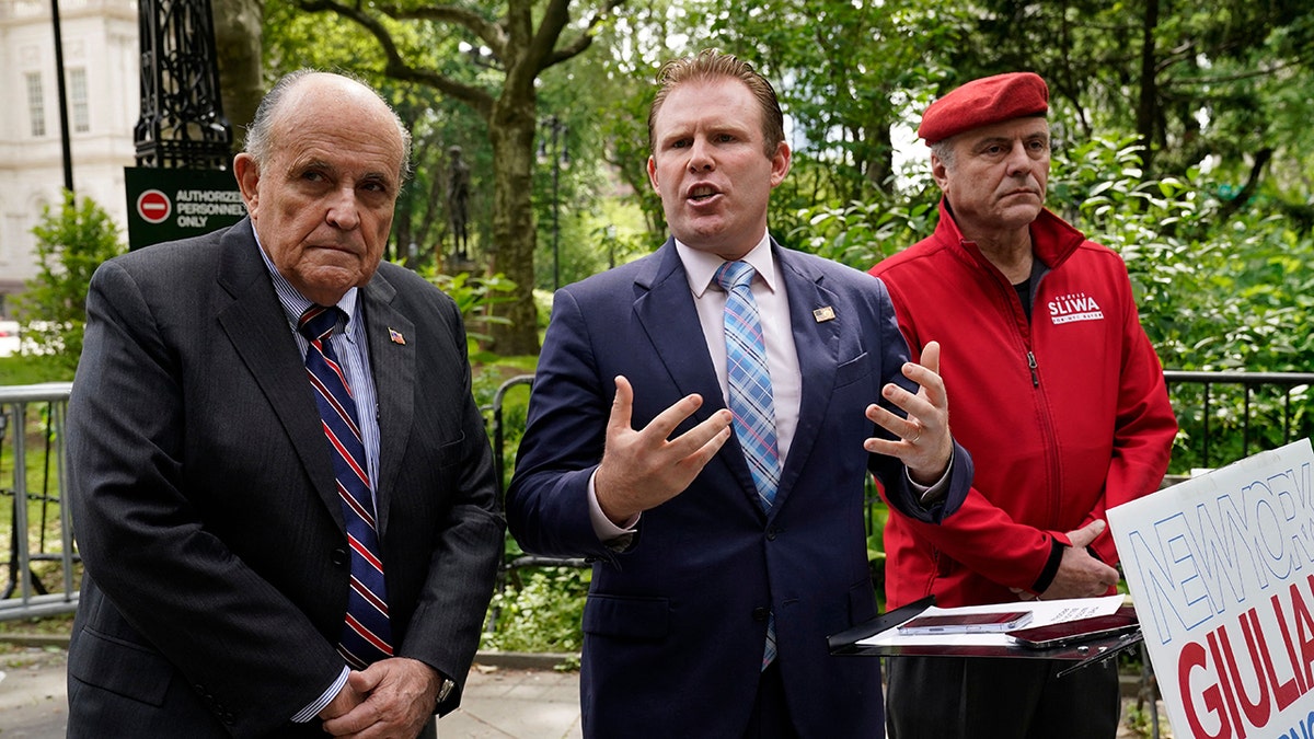 Andrew Giuliani with dad, Rudy Giuliani, and Guardian Angels' Curtis Sliwa