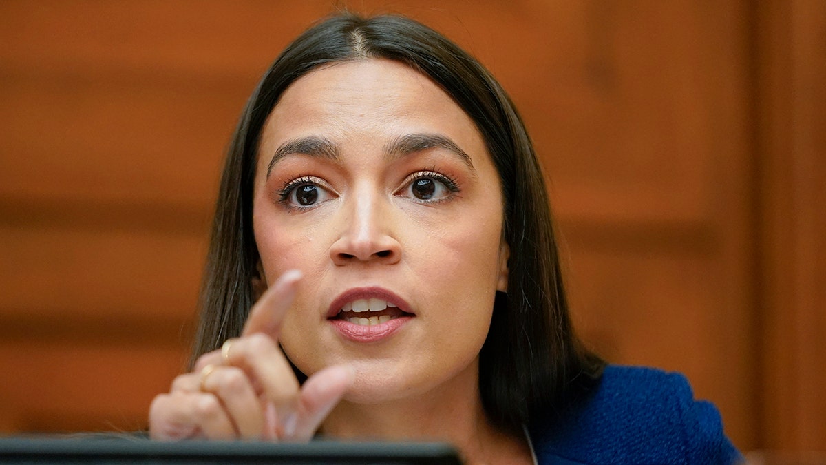 AOC points in congressional hearing