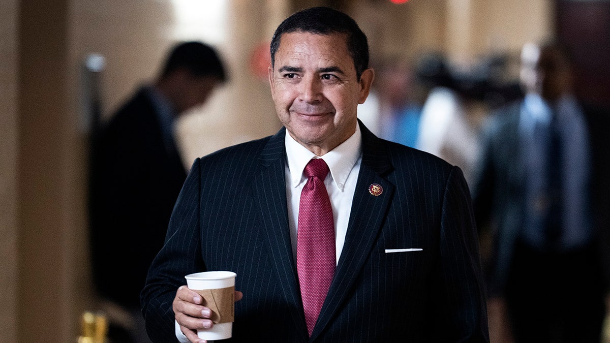 Democratic Texas Rep. Henry Cuellar walks on Capitol Hill