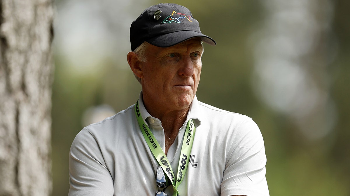 Greg Norman watches on Day2 