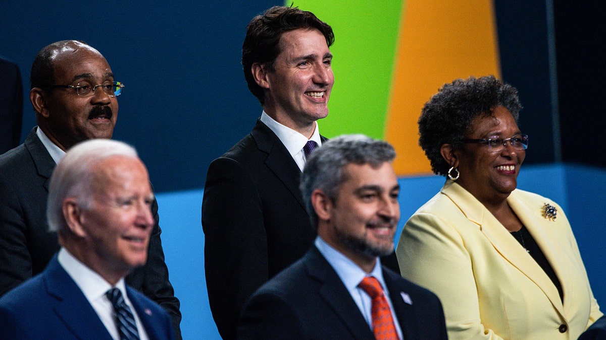 Justin Trudea, Joe Biden smile at Summit of Americas