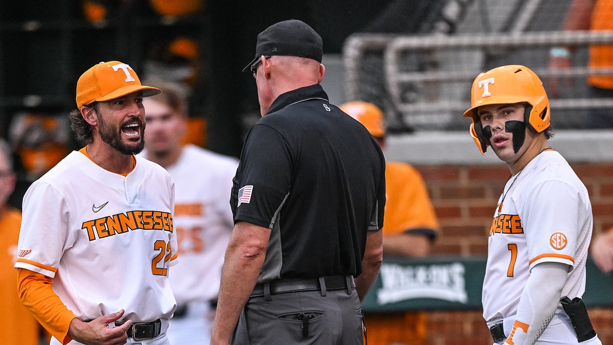 Tennessee Tony Vitello talks to umpire
