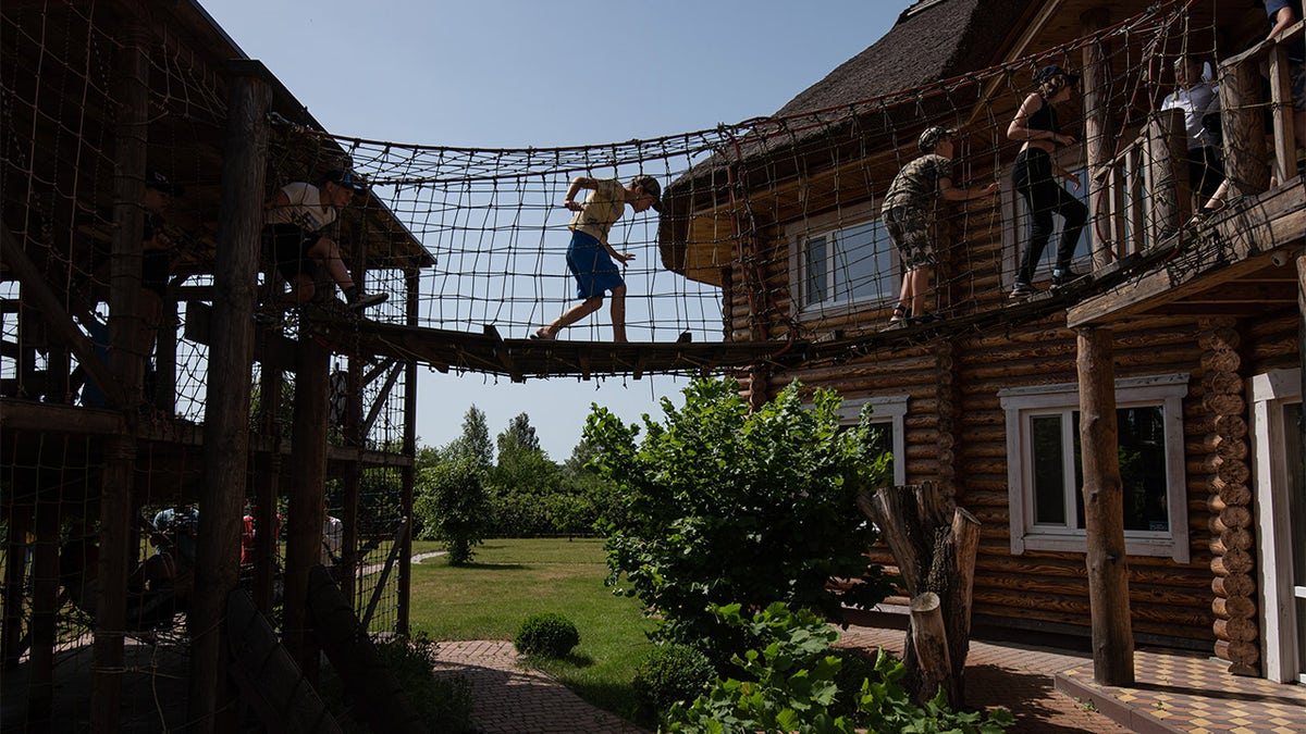 children on Ukraine summer camp playground