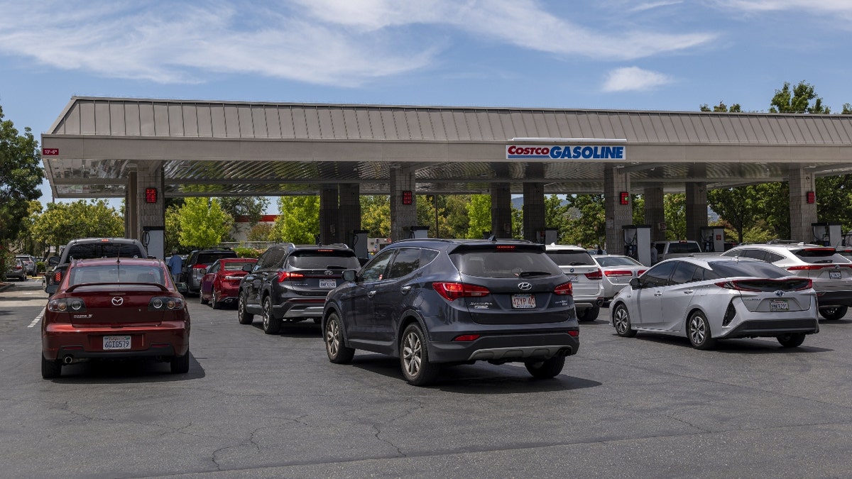 Customers line up at a Costco gas station in Concord, California, U.S., on Wednesday, June 22, 2022. President Joe Biden called on Congress to suspend the federal gasoline tax, a largely symbolic move by an embattled president running out of options to ease pump prices weighing on his party's political prospects. Photographer: David Paul Morris/Bloomberg via Getty Images