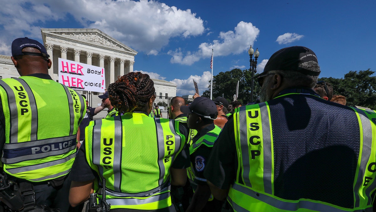 DC capitol police at supreme court protest after roe v wade overturned