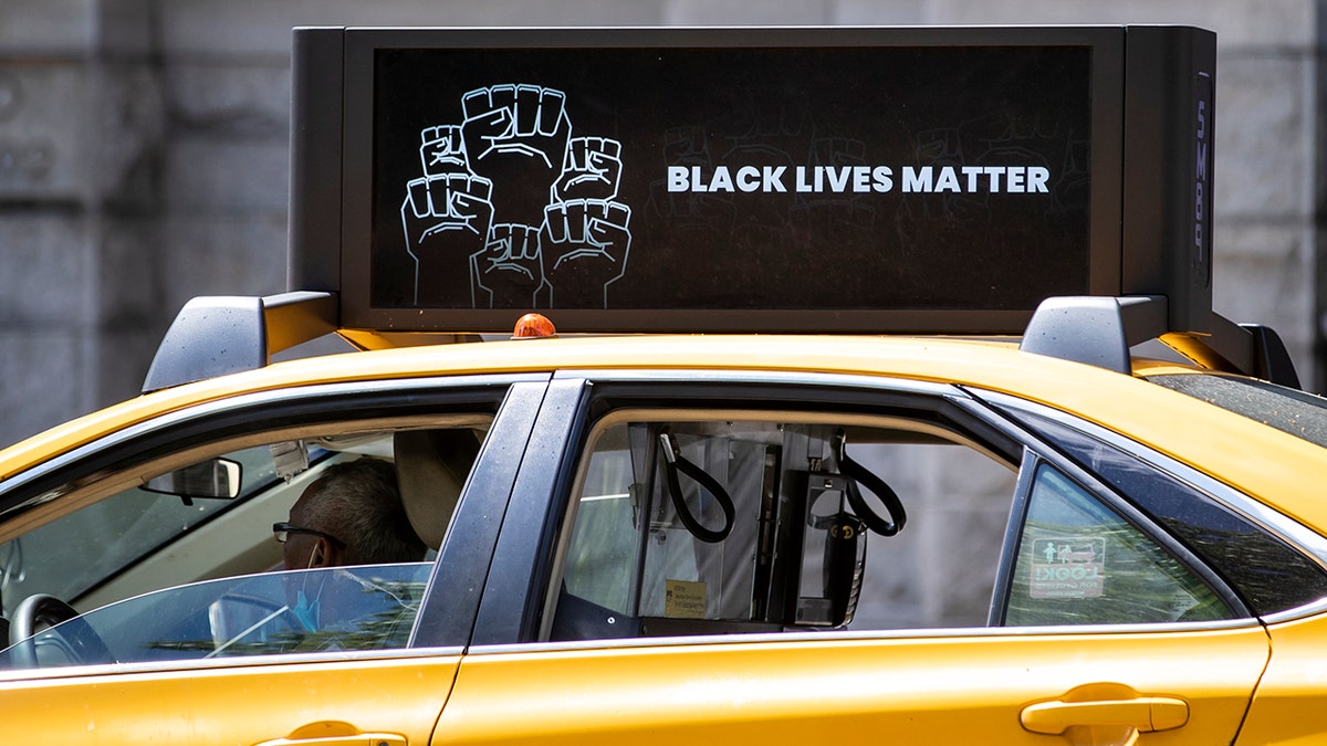 BLM sign on NYC taxi