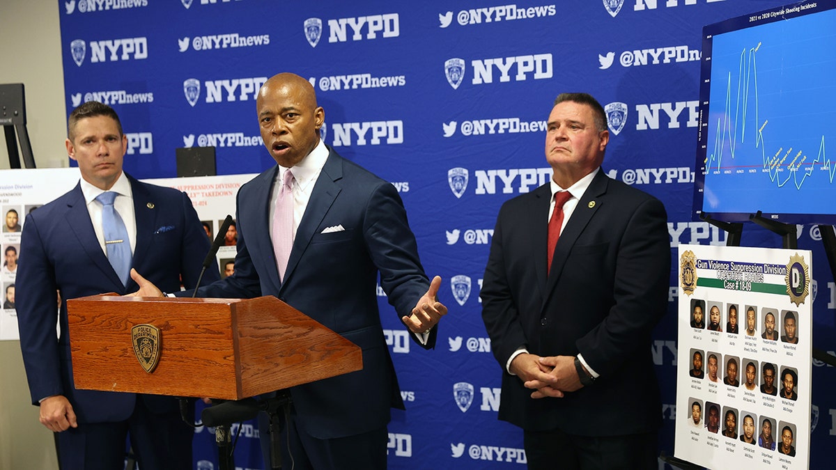 Adams and NYPD officials at press conference for gang takedowns