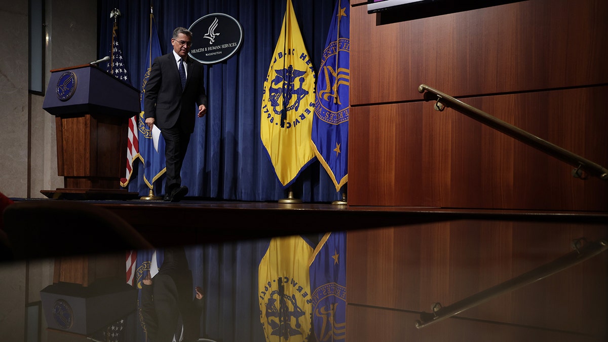 Becerra walks from stage